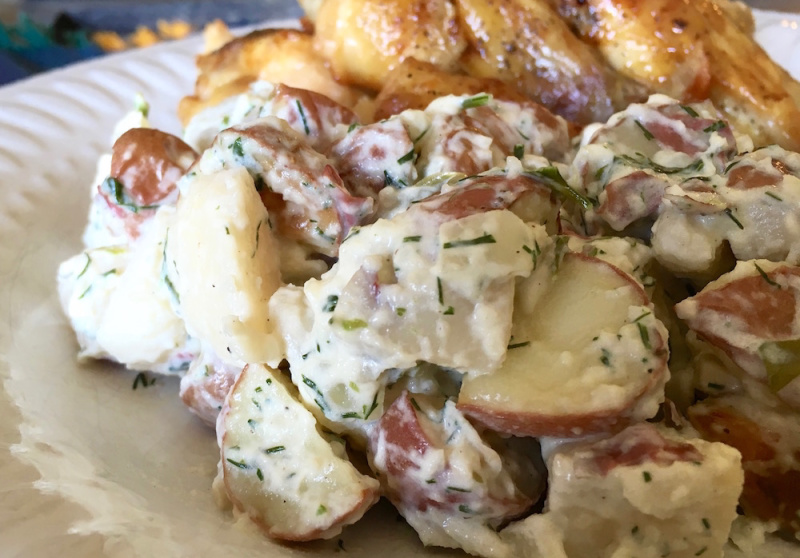 This creamy potato salad uses fresh dill and parsley for extra flavour.