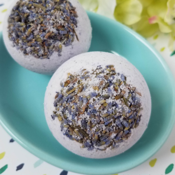 These DIY lavender bath bombs are the perfect way to use some of the lavender from your garden. Make some for yourself, and be sure to make extras to give away to friends.